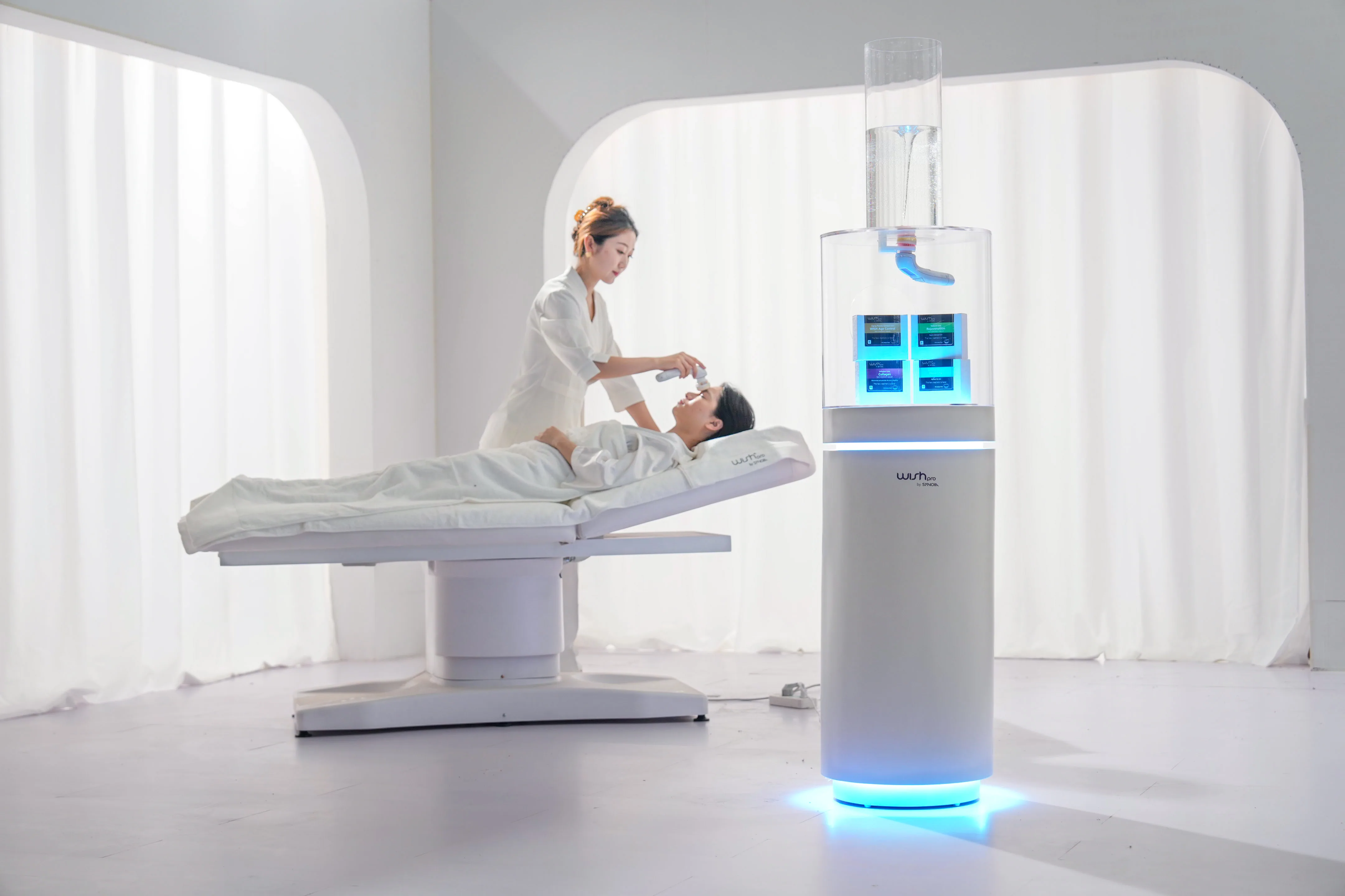 A certified cosmetician performing a WISHpro session in a professional studio